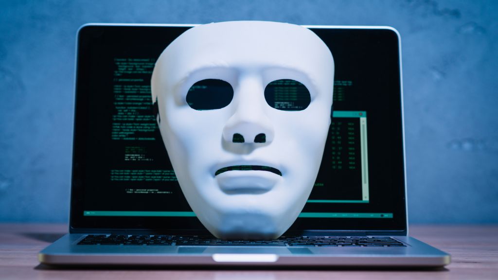  Hacker Mask on Computer 